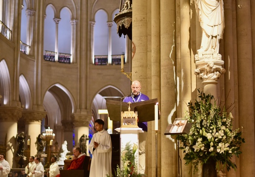 La deuxième lecture faite par un chef scout. Les scouts étaient nombreux parmi les martyrs.